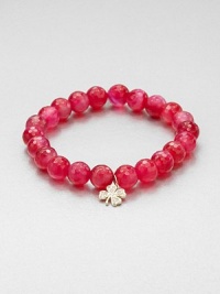 From the Peace Love Luck Collection. A faceted, pink agate beaded bracelet embellished with a diamond accented 14k gold charm. Pink agate14k goldDiamonds, .12 tcwLength, about 6.5Slip-on styleImported From the Peace Love Luck Collection. A faceted, pink agate beaded bracelet embellished with a diamond accented 14k gold charm. Pink agate14k goldDiamonds, .12 tcwLength, about 6.5Slip-on styleImported