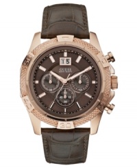 A highly detailed sport watch with textured rose-gold and exotic croco leather, by GUESS. A highly detailed sport watch with textured rose-gold and exotic croco leather, by GUESS.