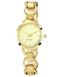 A graceful timepiece in soothing golden tones from Nine West. A graceful timepiece in soothing golden tones from Nine West.