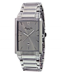Announces your arrival with this sleek industrial design by Kenneth Cole New York. Watch crafted from stainless steel bracelet and rectangular case. Gray sunray dial with vertically lined pattern features stick indices, numerals at twelve and three o'clock, date window at three o'clock and logo. Quartz movement. Water resistant to 30 meters. Limited lifetime warranty. Announces your arrival with this sleek industrial design by Kenneth Cole New York. Watch crafted from stainless steel bracelet and rectangular case. Gray sunray dial with vertically lined pattern features stick indices, numerals at twelve and three o'clock, date window at three o'clock and logo. Quartz movement. Water resistant to 30 meters. Limited lifetime warranty.