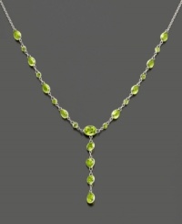 Shine bright with this gorgeous 14k white gold necklace featuring peridot (7-3/4 ct. t.w.) in round, heart and oval cuts. Approximate length: 17 inches. Approximate drop: 1-1/4 inch.