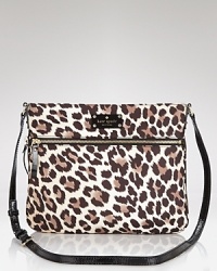 Hit print with this spot-splashed bag from kate spade new york. Designed in a slim profile with an adjustable strap for dramatic day-to-evening style, it's wildly wearable. Hit print with this spot-splashed bag from kate spade new york. Designed in a slim profile with an adjustable strap for dramatic day-to-evening style, it's wildly wearable.