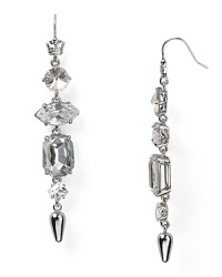 These effortless Juicy Couture earrings flaunt a linear shape, but it's really the sparkling crystal cluster that gives this look its wow factor. These effortless Juicy Couture earrings flaunt a linear shape, but it's really the sparkling crystal cluster that gives this look its wow factor.
