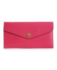 Chic and clever, this envelope-style carryall is crafted from luscious Saffiano leather and features the full functionality of a wallet. Comes with a detachable zip pouch. Chic and clever, this envelope-style carryall is crafted from luscious Saffiano leather and features the full functionality of a wallet. Comes with a detachable zip pouch.