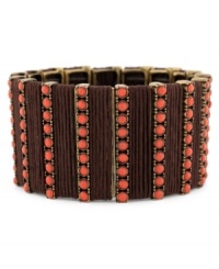 Spice up your style with this coral detailed design from Jessica Simpson. A bronze stretch design with coral bead accents. Approximate length: 8-3/4 inches. Approximate diameter: 2-1/2 inches. Spice up your style with this coral detailed design from Jessica Simpson. A bronze stretch design with coral bead accents. Approximate length: 8-3/4 inches. Approximate diameter: 2-1/2 inches.