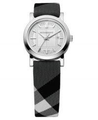 This Burberry timepiece features a Beat Check fabric strap and round stainless steel case. Engraved silvertone dial with tonal stick indices, logo and date window. Swiss made. Swiss movement. Water resistant to 50 meters. Two-year limited warranty. Style #BU1386 This Burberry timepiece features a Beat Check fabric strap and round stainless steel case. Engraved silvertone dial with tonal stick indices, logo and date window. Swiss made. Swiss movement. Water resistant to 50 meters. Two-year limited warranty. Style #BU1386