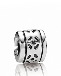 A decorative cutout design gives this sterling silver PANDORA charm artful appeal. A decorative cutout design gives this sterling silver PANDORA charm artful appeal.