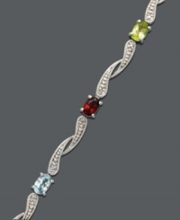 Add swirling sparkle and drops of color to liven up your ensemble. Victoria Townsend bracelet features oval-cut amethyst (3/4 ct. t.w.), blue topaz (1 ct. t.w.), citrine (3/4 ct. t.w.), garnet (1-1/10 ct. t.w.), peridot (8/10 ct. t.w.) and diamond accents. Set in sterling silver. Approximate length: 7 inches. Add swirling sparkle and drops of color to liven up your ensemble. Victoria Townsend bracelet features oval-cut amethyst (3/4 ct. t.w.), blue topaz (1 ct. t.w.), citrine (3/4 ct. t.w.), garnet (1-1/10 ct. t.w.), peridot (8/10 ct. t.w.) and diamond accents. Set in sterling silver. Approximate length: 7 inches.