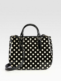 A versatile shape in glossy patent leather is freshened with vintage-inspired polka dots. Detachable shoulder strap, 20½ dropDouble adjustable top handles, 3¼-5 dropMagnetic snap closureOne inside zip pocketTwo inside open pocketsCotton lining13W X 10H X 5DImported A versatile shape in glossy patent leather is freshened with vintage-inspired polka dots. Detachable shoulder strap, 20½ dropDouble adjustable top handles, 3¼-5 dropMagnetic snap closureOne inside zip pocketTwo inside open pocketsCotton lining13W X 10H X 5DImported
