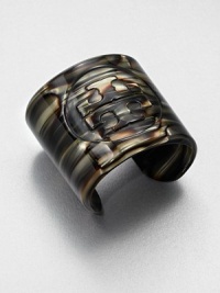 A subtle logo embossed on a wide resin design. ResinLength, about 8Slip-on styleImported A subtle logo embossed on a wide resin design. ResinLength, about 8Slip-on styleImported