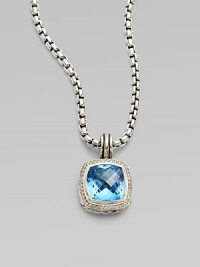 From the Albion Collection. A beautiful faceted blue topaz center stone surrounded by dazzling diamonds. Diamonds, .3 tcw Blue topaz Sterling silver Size, about ½L X ½ W Imported Please note: Chain sold separately. From the Albion Collection. A beautiful faceted blue topaz center stone surrounded by dazzling diamonds. Diamonds, .3 tcw Blue topaz Sterling silver Size, about ½L X ½ W Imported Please note: Chain sold separately.