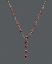 Ignite a flame with bold color along your neckline. This dramatic v-shaped necklace features brilliant oval-cut, round-cut, and pear-cut garnet (8-5/8 ct. t.w.) in a 14k gold setting. Approximate length: 17 inches. Approximate drop: 1-1/2 inches. Ignite a flame with bold color along your neckline. This dramatic v-shaped necklace features brilliant oval-cut, round-cut, and pear-cut garnet (8-5/8 ct. t.w.) in a 14k gold setting. Approximate length: 17 inches. Approximate drop: 1-1/2 inches.