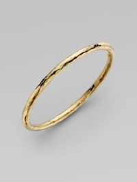 From the Martellato Collection. A luminous accent for the wrist is designed with the unique hammered look of 18k yellow gold. Chic to wear alone or doubled up with others. 18k yellow gold Diameter, about 3 Made in Italy From the Martellato Collection. A luminous accent for the wrist is designed with the unique hammered look of 18k yellow gold. Chic to wear alone or doubled up with others. 18k yellow gold Diameter, about 3 Made in Italy