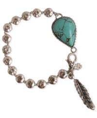 Feeling plucky? This link bracelet from Lucky Brand is crafted from silver-tone mixed metal, and features semi-precious turquoise and glass accents for a casual fashion statement. Item comes packaged in a signature Lucky Brand Box. Approximate length: 7 inches. Feeling plucky? This link bracelet from Lucky Brand is crafted from silver-tone mixed metal, and features semi-precious turquoise and glass accents for a casual fashion statement. Item comes packaged in a signature Lucky Brand Box. Approximate length: 7 inches.