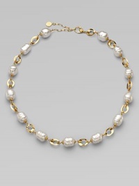 This unique and chic design of baroque pearls and three dimensional 18k gold oval links is simply stunning.12mm baroque white organic man-made pearls18k goldplated sterling silverLength, about 16 to 18 adjustableLobster clasp closureImported This unique and chic design of baroque pearls and three dimensional 18k gold oval links is simply stunning.12mm baroque white organic man-made pearls18k goldplated sterling silverLength, about 16 to 18 adjustableLobster clasp closureImported