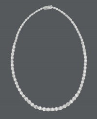 Looking for the perfect finishing touch? B. Brilliant's graduated cubic zirconia necklace (14 ct. t.w.) takes your evening wear to the next level. Crafted in sterling silver. Approximate length: 17 inches. Looking for the perfect finishing touch? B. Brilliant's graduated cubic zirconia necklace (14 ct. t.w.) takes your evening wear to the next level. Crafted in sterling silver. Approximate length: 17 inches.