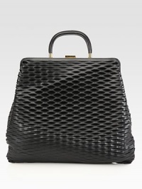 A roomy design in an edgy perforated leather style.Double top handles, 3¼ dropTop clasp closureSuede lining14¾W X 12½H X 2DMade in Italy A roomy design in an edgy perforated leather style.Double top handles, 3¼ dropTop clasp closureSuede lining14¾W X 12½H X 2DMade in Italy
