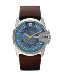 Seamlessly marrying modern and traditional aesthetics, this Diesel watch plays well with a wide range of personal styles. Brown leather strap and round stainless steel case, 45x27mm. Bezel engraved with logo at three o'clock. Blue sunray dial featuring a matte texture with printed and applied stick indices, numeral at twelve o'clock, day and date window at three o'clock and yellow accents. Quartz movement. Water resistant to 100 meters. Two-year limited warranty. Seamlessly marrying modern and traditional aesthetics, this Diesel watch plays well with a wide range of personal styles. Brown leather strap and round stainless steel case, 45x27mm. Bezel engraved with logo at three o'clock. Blue sunray dial featuring a matte texture with printed and applied stick indices, numeral at twelve o'clock, day and date window at three o'clock and yellow accents. Quartz movement. Water resistant to 100 meters. Two-year limited warranty.