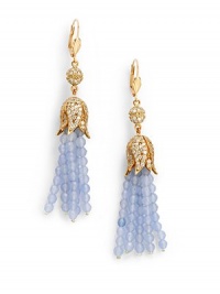 THE LOOKFeminine Metals collectionRhinestone ball and flower detailAquamarine-colored tassel accent14k goldplated settingLatch back closureTHE MEASUREMENTLength, about 3ORIGINImported THE LOOKFeminine Metals collectionRhinestone ball and flower detailAquamarine-colored tassel accent14k goldplated settingLatch back closureTHE MEASUREMENTLength, about 3ORIGINImported