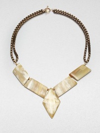A geometric design featuring recycled cow horn on antique-finished box chains. Recycled Ankole cow hornBrassLength, about 21Lobster clasp closureMade in USA A geometric design featuring recycled cow horn on antique-finished box chains. Recycled Ankole cow hornBrassLength, about 21Lobster clasp closureMade in USA