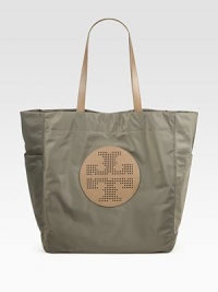 A perforated signature medallion is at the center of this roomy carryall, pairing sleek nylon with luxe Saffiano leather. Double leather top handles, 9 dropMagnetic snap closureTwo outside open pocketsOne inside zip pocketTwo inside open pocketsCanvas lining15W X 14¼H X 5DImported A perforated signature medallion is at the center of this roomy carryall, pairing sleek nylon with luxe Saffiano leather. Double leather top handles, 9 dropMagnetic snap closureTwo outside open pocketsOne inside zip pocketTwo inside open pocketsCanvas lining15W X 14¼H X 5DImported