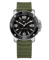 Let the adventure begin and bring this watch by Tommy Hilfiger along with you. Olive green silicone strap with faux link texture and round stainless steel case with white numerals at black bezel. Black dial features applied silver tone numerals at twelve, three, six and nine o'clock, stick indices, date window, three hands an iconic flag logo. Quartz movement. Water resistant to 30 meters. Ten-year limited warranty. Let the adventure begin and bring this watch by Tommy Hilfiger along with you. Olive green silicone strap with faux link texture and round stainless steel case with white numerals at black bezel. Black dial features applied silver tone numerals at twelve, three, six and nine o'clock, stick indices, date window, three hands an iconic flag logo. Quartz movement. Water resistant to 30 meters. Ten-year limited warranty.