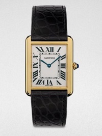 From the Tank Collection. A radiant 18k gold timepiece that combines the past with the present, making it quintessentially Cartier. Quartz movementWater resistant to 3 ATMRectangular 18k gold case, 34.8mm (1.4) X 27.4mm (1)Smooth bezelPale silver opaline dialRoman numeral hour markersAlligator strap with 18k gold buckleMade in Switzerland From the Tank Collection. A radiant 18k gold timepiece that combines the past with the present, making it quintessentially Cartier. Quartz movementWater resistant to 3 ATMRectangular 18k gold case, 34.8mm (1.4) X 27.4mm (1)Smooth bezelPale silver opaline dialRoman numeral hour markersAlligator strap with 18k gold buckleMade in Switzerland