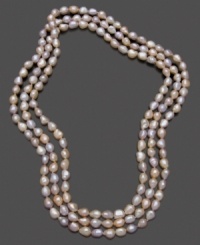 Soft pink and peach tones add subtle accent to this beautiful cultured freshwater pearl (7-8 mm) necklace. Approximate length: 64 inches.