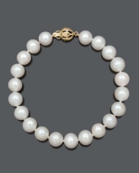 Embrace the subtlety of traditional style. This classic bracelet features AA+ cultured freshwater pearls (8-9 mm) with a 14k gold clasp. Approximate length: 7-1/2 inches. Embrace the subtlety of traditional style. This classic bracelet features AA+ cultured freshwater pearls (8-9 mm) with a 14k gold clasp. Approximate length: 7-1/2 inches.