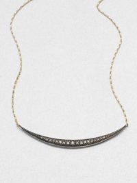 An elegantly tapered row of diamonds twinkles from a graceful crescent pendant of oxidized sterling silver, suspended at each end from a pretty 14k gold chain.Diamonds, .17 tcwSterling silver and 14k yellow goldChain length, about 16Pendant width, about 2¼Spring ring claspMade in USA An elegantly tapered row of diamonds twinkles from a graceful crescent pendant of oxidized sterling silver, suspended at each end from a pretty 14k gold chain.Diamonds, .17 tcwSterling silver and 14k yellow goldChain length, about 16Pendant width, about 2¼Spring ring claspMade in USA