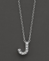 From the Tiny Treasures collection, a diamond J necklace. With signature ruby accent. Designed by Roberto Coin.