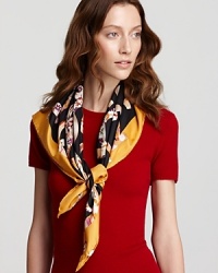Tie on this Salvatore Ferragamo Gancini ribbon print silk scarf; in black with a gold border, it will pull your whole wardrobe together. Tie on this Salvatore Ferragamo Gancini ribbon print silk scarf; in black with a gold border, it will pull your whole wardrobe together.