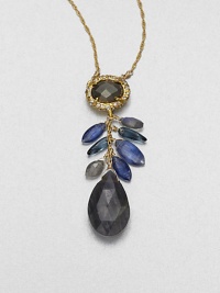 From the Elements Siyabona Collection. One bold faceted teardrop and a cluster of tiny faceted leaves hang from a deeply colored oval framed in Swarovski crystals, all on a graceful golden chain.CrystalLabradorite, blue kynite and pyriteGoldtoneLength, about 16 with 3 extenderLobster claspMade in USA