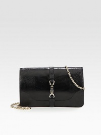 Genuine lizard-skin in a petite, structured bag topped with a piston closure and chic chain strap.Removable shoulder strap, 15 dropPush-lock flap closureTwo inner expandable zip compartmentsSix credit card slotsLinen lining8¼W X 5H X 1¼DMade in Italy Genuine lizard-skin in a petite, structured bag topped with a piston closure and chic chain strap.Removable shoulder strap, 15 dropPush-lock flap closureTwo inner expandable zip compartmentsSix credit card slotsLinen lining8¼W X 5H X 1¼DMade in Italy