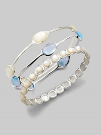 Five exquisite blue topaz cabochon stations set in sleek sterling silver. Blue topazSterling silverDiameter, about 2½Slip-on styleImported Please note: Bracelets sold separately. Five exquisite blue topaz cabochon stations set in sleek sterling silver. Blue topazSterling silverDiameter, about 2½Slip-on styleImported Please note: Bracelets sold separately.