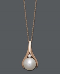 A timeless look that's simple and sophisticated. A traditional cultured freshwater pearl (9-1/2-10 mm) and round-cut diamond accent take on a slightly modern touch with the addition of a 14k rose gold setting. Approximate length: 18 inches. Approximate drop: 3/4 inch. A timeless look that's simple and sophisticated. A traditional cultured freshwater pearl (9-1/2-10 mm) and round-cut diamond accent take on a slightly modern touch with the addition of a 14k rose gold setting. Approximate length: 18 inches. Approximate drop: 3/4 inch.
