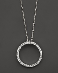 From the Tiny Treasures collection, a small diamond circle necklace; with signature ruby accent. Designed by Roberto Coin. From the Tiny Treasures collection, a small diamond circle necklace; with signature ruby accent. Designed by Roberto Coin.