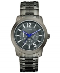 Set the tone for your day with this gunmetal-graced steel watch from GUESS. Set the tone for your day with this gunmetal-graced steel watch from GUESS.
