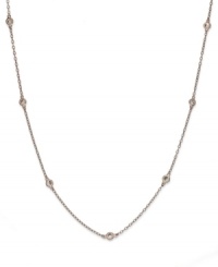 Inch by inch of luminous sparkle. B. Brilliant's delicate necklace features nine round-cut cubic zirconia stations (9/10 ct. t.w.) set in 18k gold over sterling silver. Approximate length: 20 inches.