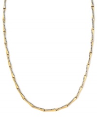 Golden and glamorous, this stylish X-patterned necklace dazzles with diamond accents. Crafted from 14k gold. Approximate length: 17 inches. Approximate width: 1/8 inch.