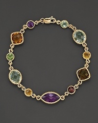 Blending a gorgeous array of colorful gemstones with 14 Kt. yellow gold, this station bracelet will complement all of your favorite looks. Blending a gorgeous array of colorful gemstones with 14 Kt. yellow gold, this station bracelet will complement all of your favorite looks.