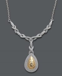 Versatile style that makes a statement. Giani Bernini's stunning statement necklace features an intricate crisscross design and a hammered teardrop-shaped pendant. Set in 24k gold over sterling silver and sterling silver. Approximate length: 17 inches Approximate drop: 1-1/2 inches. Versatile style that makes a statement. Giani Bernini's stunning statement necklace features an intricate crisscross design and a hammered teardrop-shaped pendant. Set in 24k gold over sterling silver and sterling silver. Approximate length: 17 inches Approximate drop: 1-1/2 inches.