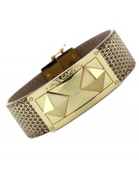 Stand out from the crowd. Pyramid studs bring a fashionable edge to this magnetic snap bracelet from Vince Camuto. Crafted from gold-tone mixed metal. Approximate length: 8 inches. Stand out from the crowd. Pyramid studs bring a fashionable edge to this magnetic snap bracelet from Vince Camuto. Crafted from gold-tone mixed metal. Approximate length: 8 inches.