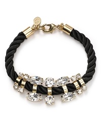 Crystal stones dress up a twisted cord on this bracelet from nOir. Equal parts crafty and cool, it instantly adds summer-perfect sparkle to your arm army. Crystal stones dress up a twisted cord on this bracelet from nOir. Equal parts crafty and cool, it instantly adds summer-perfect sparkle to your arm army.