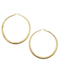 Hoop to it! Every girl needs to add a standout pair of hoop earrings to her collection. RACHEL Rachel Roy's extra-large style features a click backing crafted in gold tone mixed metal. Approximate diameter: 3 inches. Hoop to it! Every girl needs to add a standout pair of hoop earrings to her collection. RACHEL Rachel Roy's extra-large style features a click backing crafted in gold tone mixed metal. Approximate diameter: 3 inches.