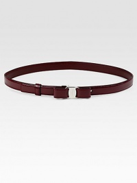 Rendered in shiny patent leather with silvertone bow buckle.Width, about .78Made in Italy Rendered in shiny patent leather with silvertone bow buckle.Width, about .78Made in Italy