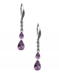 Polish your look with not one, but two, vibrant pops of color! Judith Jack's stunning drop earrings feature two pear-cut amethyst drops (3-5/8 ct. t.w.) and glittering marcasite (1/5 ct. t.w.). Set in sterling silver. Approximate drop: 1-3/4 inches. Polish your look with not one, but two, vibrant pops of color! Judith Jack's stunning drop earrings feature two pear-cut amethyst drops (3-5/8 ct. t.w.) and glittering marcasite (1/5 ct. t.w.). Set in sterling silver. Approximate drop: 1-3/4 inches.