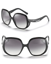 Look glamorous in oversized sunglasses with round keyhole temples by Balenciaga. Look glamorous in oversized sunglasses with round keyhole temples by Balenciaga.