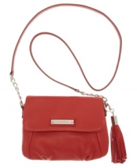 Luxe leather and high-shine hardware will keep your style poised, polished and on point. With a fun tassel detail and travel-ready silhouette, this Calvin Klein style is ideal for day, night or anytime in between. Luxe leather and high-shine hardware will keep your style poised, polished and on point. With a fun tassel detail and travel-ready silhouette, this Calvin Klein style is ideal for day, night or anytime in between.