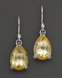 Faceted, pear-cut canary crystals, set in sterling silver, make a classic style statement. Faceted, pear-cut canary crystals, set in sterling silver, make a classic style statement.